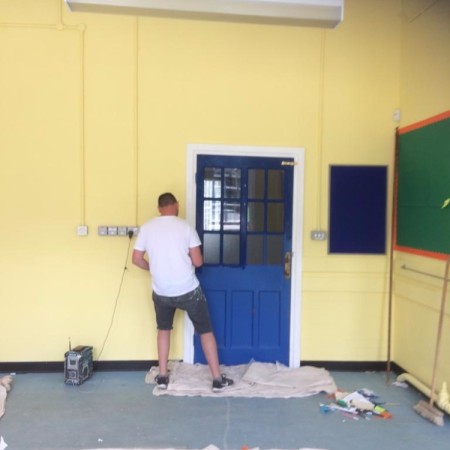 Painting a classroom at Coldfall Primary School, Muswell Hill, London