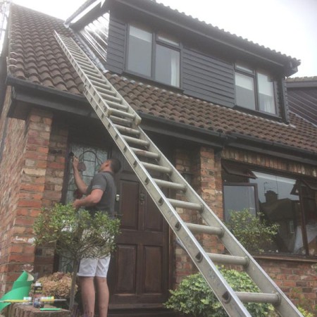 Exterior Property Decorating in Whetstone, all completed on ladders.
