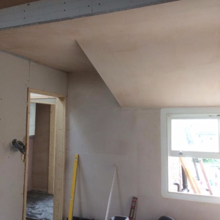 North London loft conversion including: plaster boarding, plastering, carpentry, painting & MDF inbuilt cupboards -
